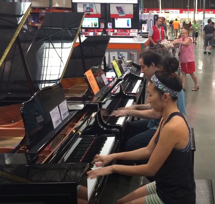 Costco Shopper And Salesman Play Beautiful Duet In Costco